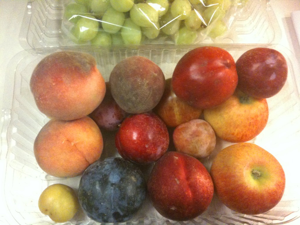 box of organic fruit from local farms
