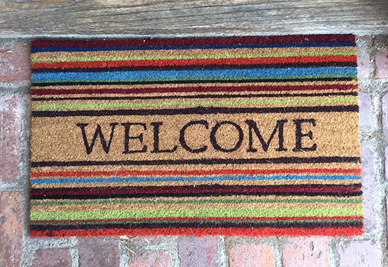 picture of coir mat with horizontal stripes and word "Welcome" in center