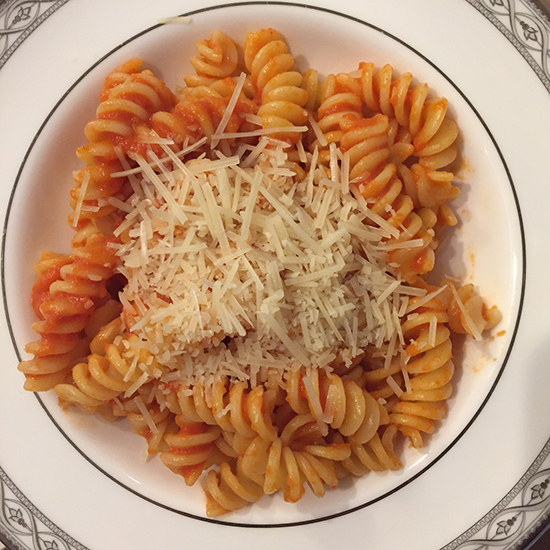 Bowl of rotini with Marcella Hazan's tomato sauce and parmesan