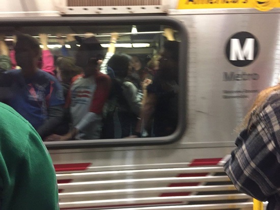 Blurry motion picture of full Metro Red Line car carrying 2017 Women's March participants to downtown L.A.