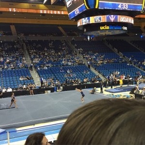 gymnastics meet warmup at Pauley Pavilion, from stands