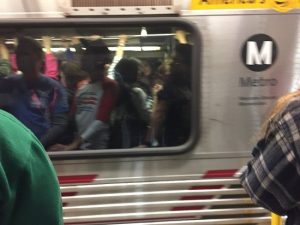 Blurry motion picture of full Metro Red Line car carrying 2017 Women's March participants to downtown L.A.